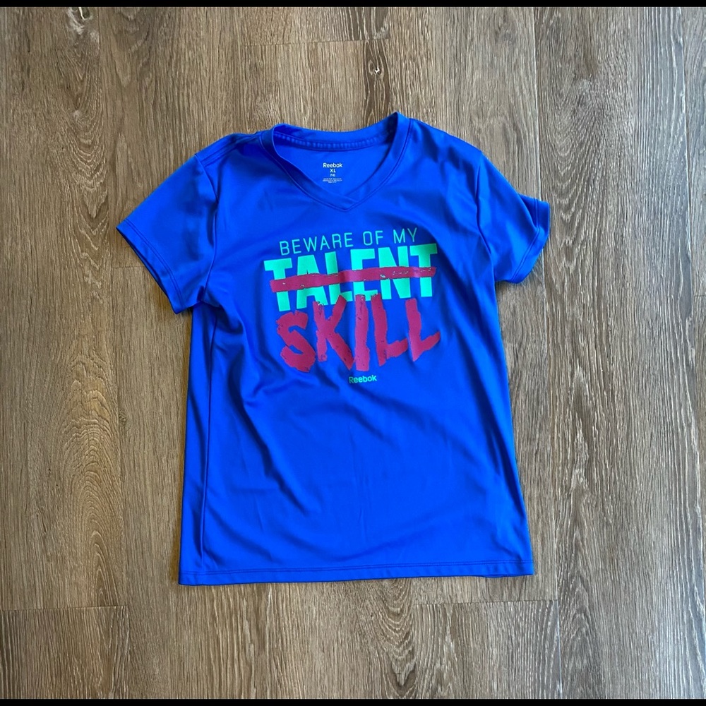 Girls blue Reebok t shirt. Size XL/16.